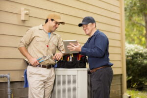 technicians-working-on-air-conditioner